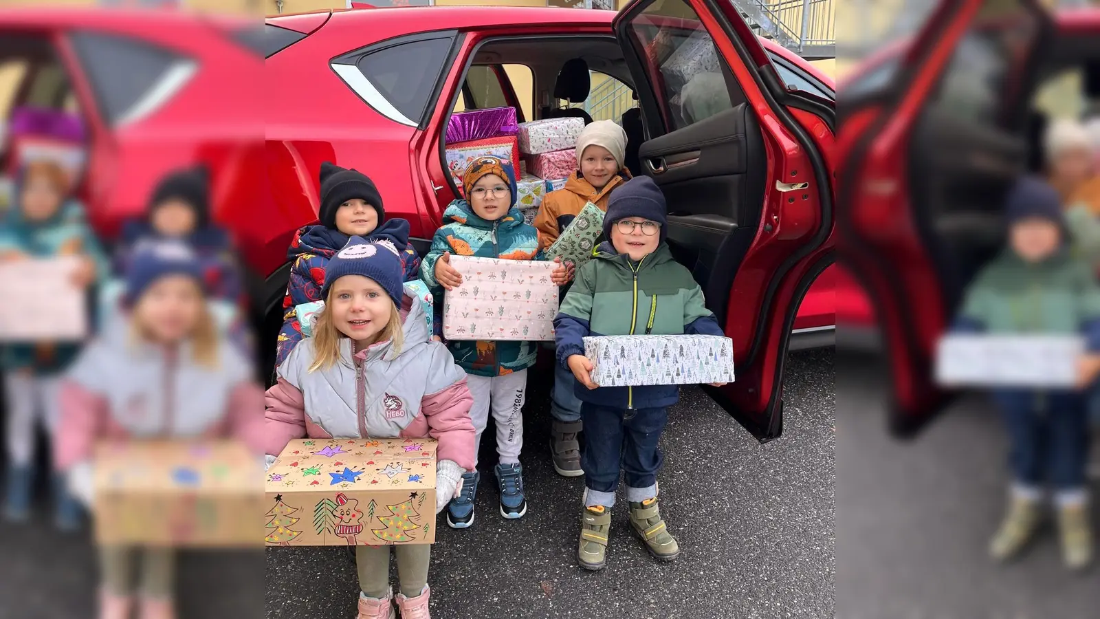 Kinder der Einrichtung mit gefüllten Päckchen. (Bild: Elternbeirat Marien-Kindergarten / Haus des Kindes)