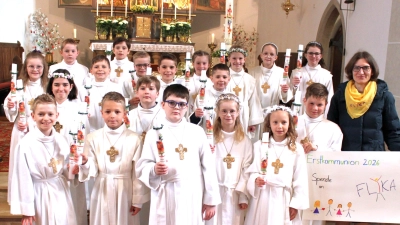 Erstkommunionkinder mit Frau Dr.med. Birgit Prey. (Bild: Martin Wolf)
